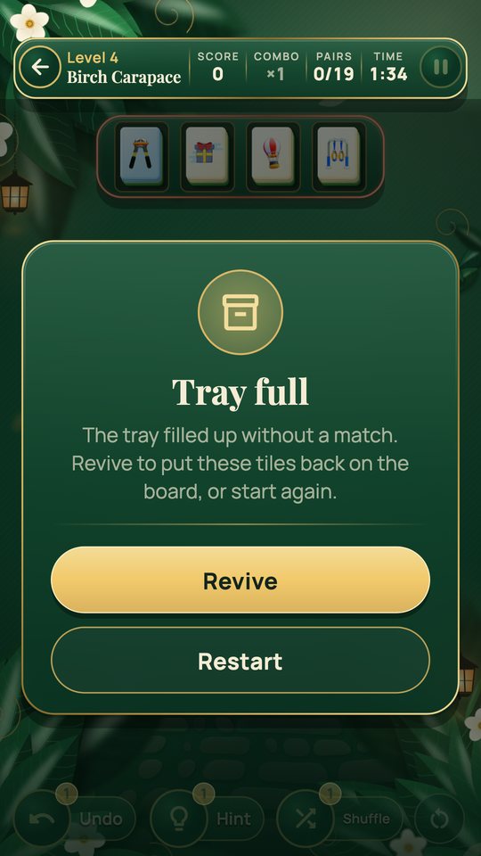 The Tray full card with Revive and Restart buttons